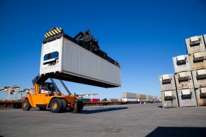 Heavy equipment carrying reefer container